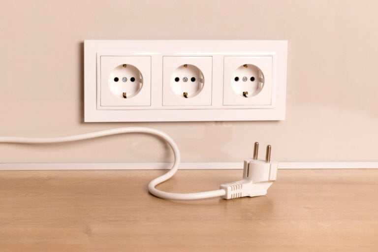 Unplugged power cord and electrical outlet for home improvement projects